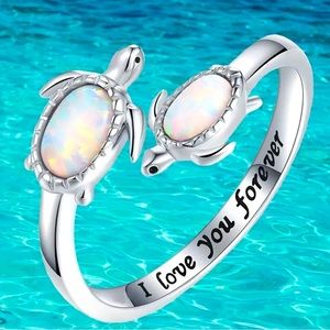 Silver plated adjustable ring with lab created opals on twin turtles 
NWT